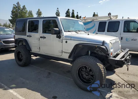 2011 Jeep Wrangler Unlimited Sahara из США, поврежденный, VIN 1J4BA5H16BL521963